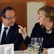 Merkel with Hollande at a Franco-German cabinet meeting.